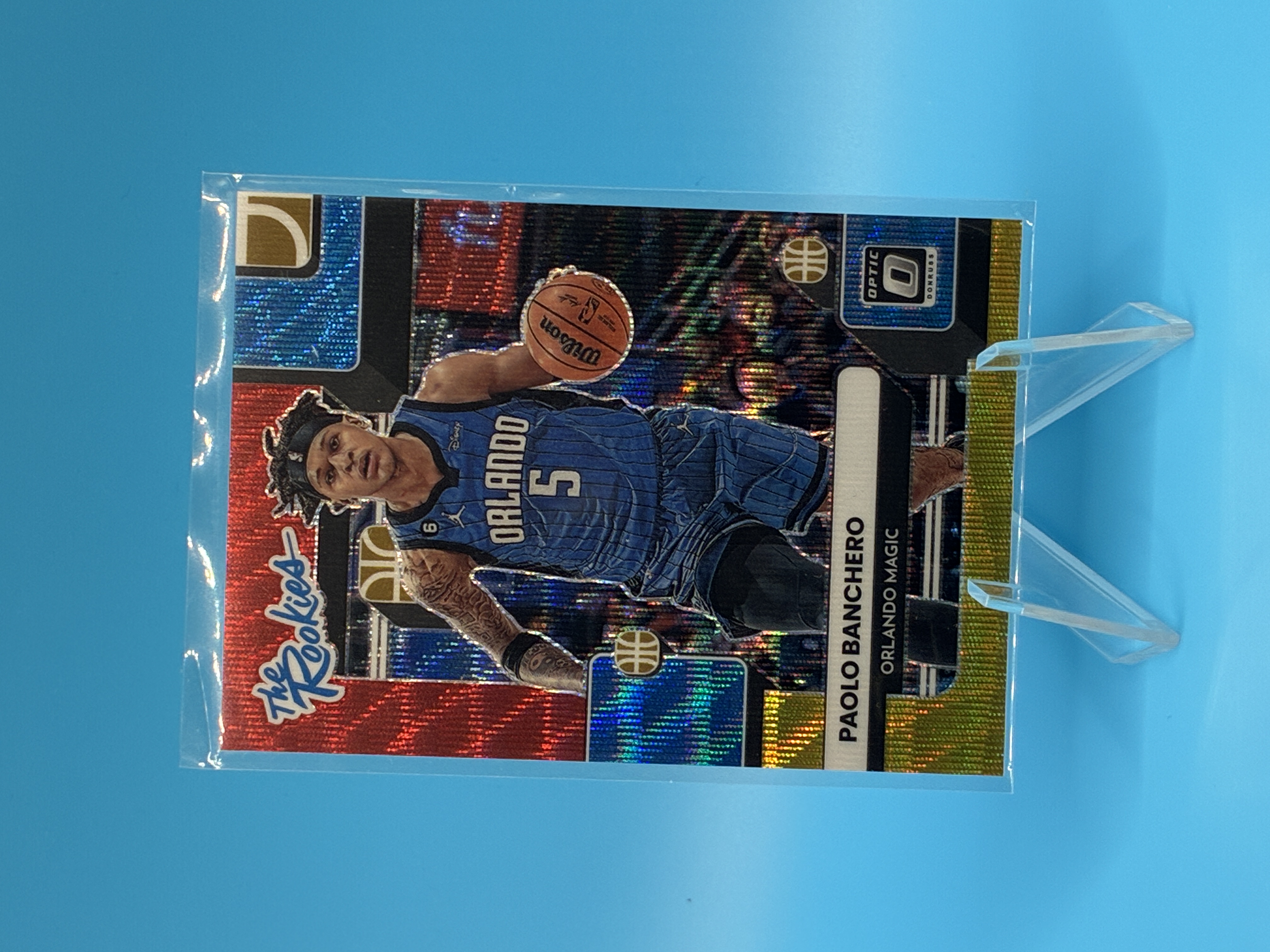2022/2023 Panini Optic Paolo Banchero Red Blue Gold The Rookies 93/99 #1 Orlando Magic – Vorderseite