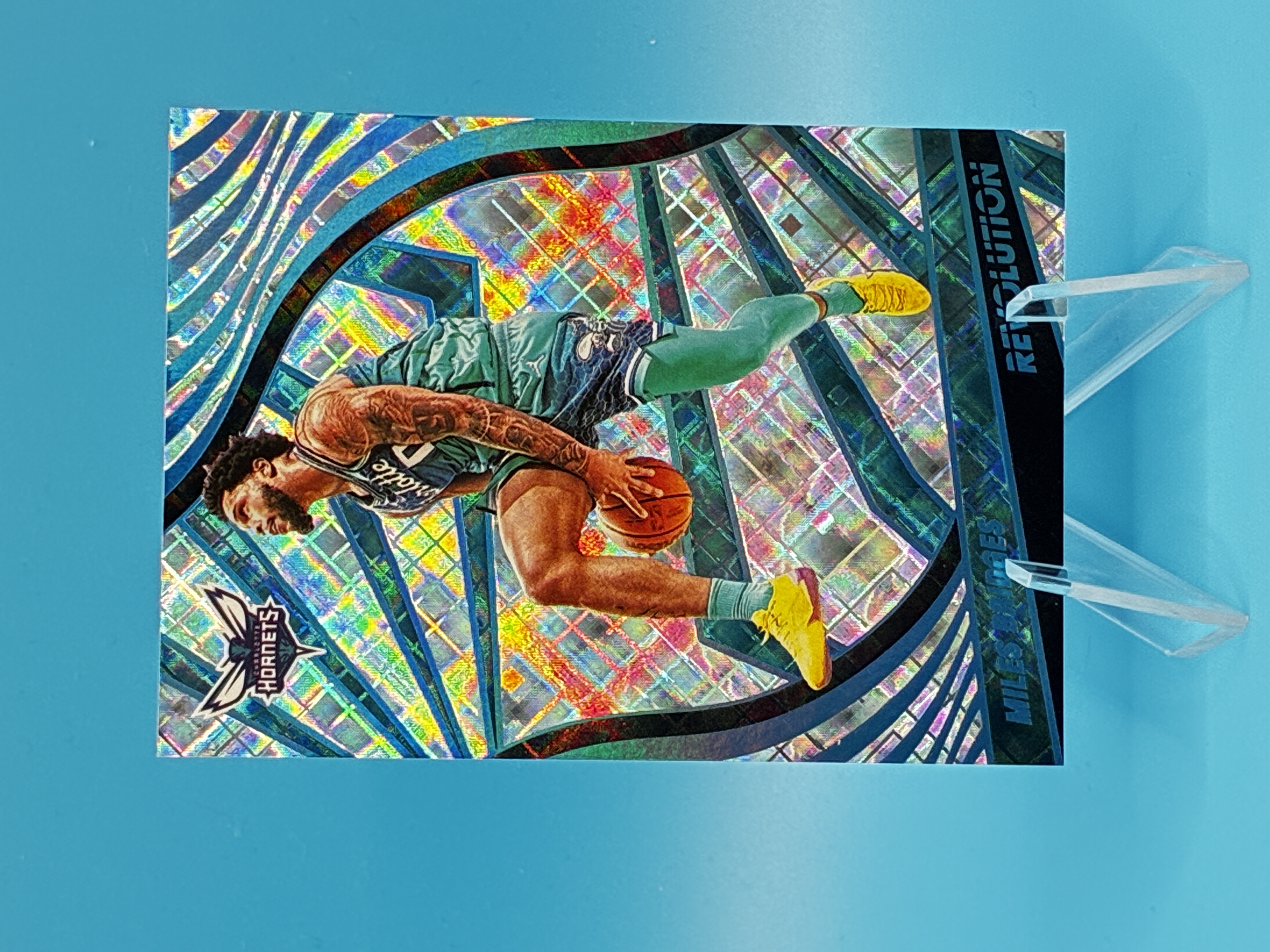 2021/2022 Panini Revolution Miles Bridges Cosmic 12/99 #99 Charlotte Hornets – Vorderseite