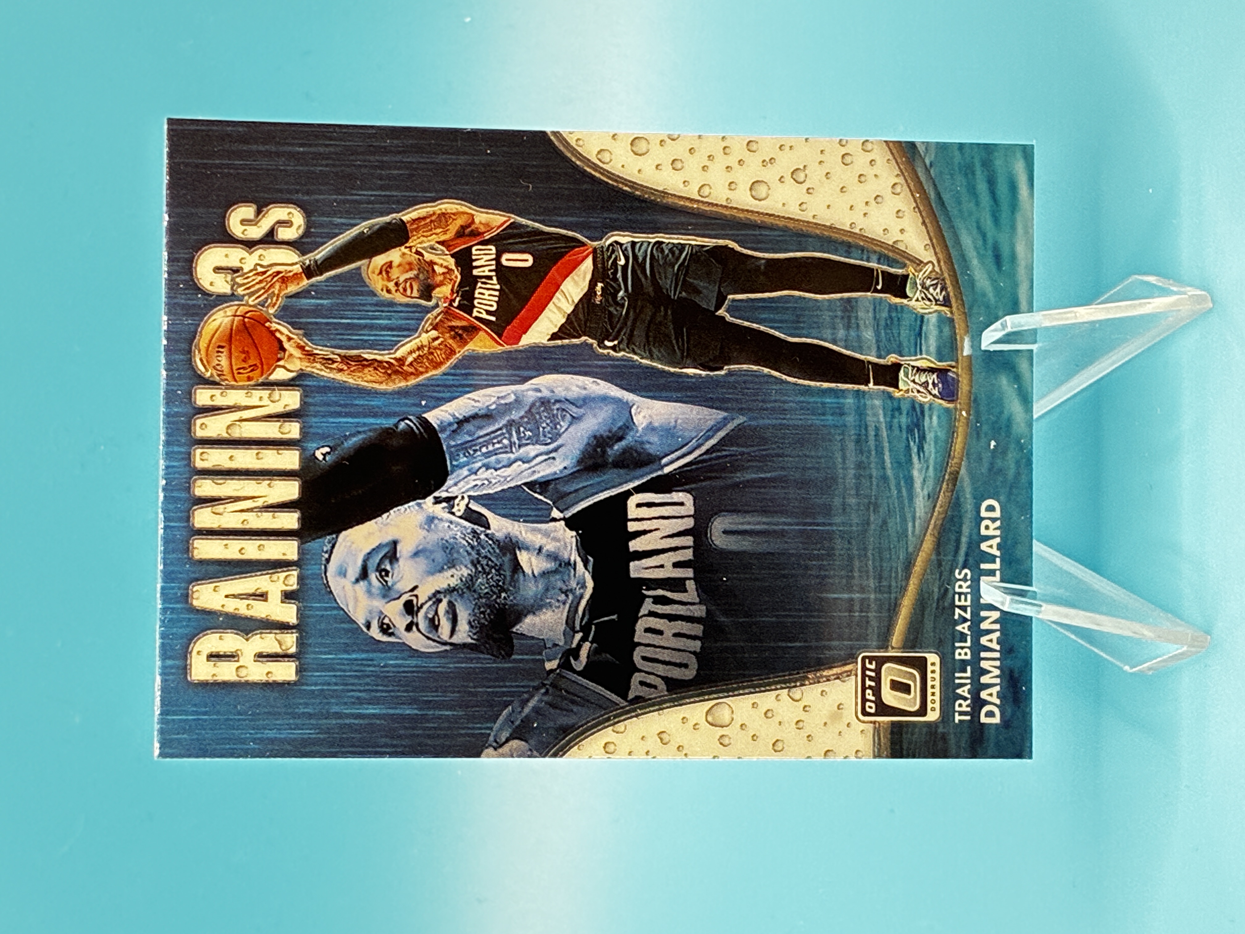 2022/2023 Panini Optic Damian Lillard Raining 3s #14 Portland Trail Blazers – Vorderseite