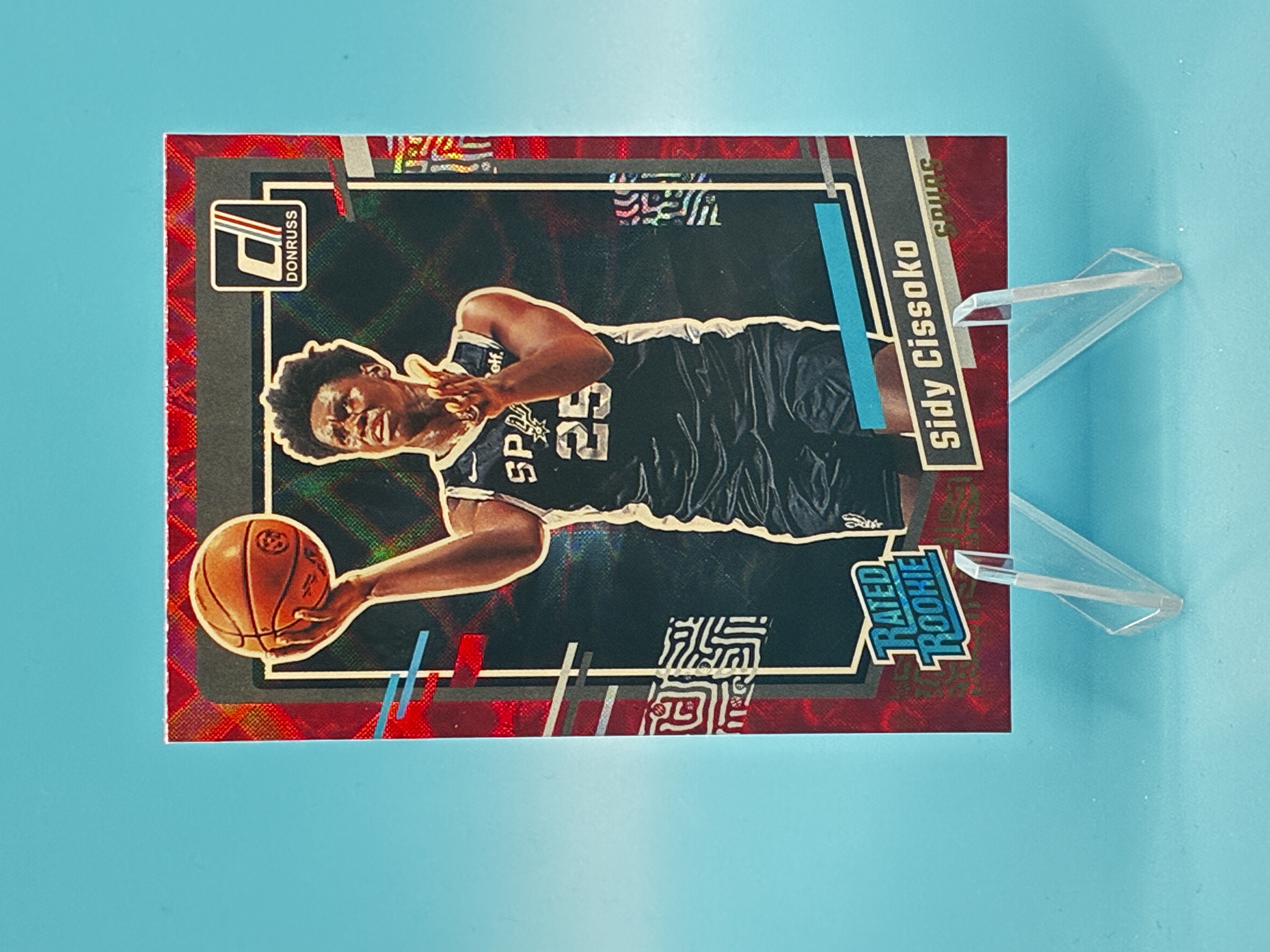 2023/2024 Panini Donruss Sidy Cissoko Red Laser Rated Rookie #223 San Antonio Spurs – Vorderseite