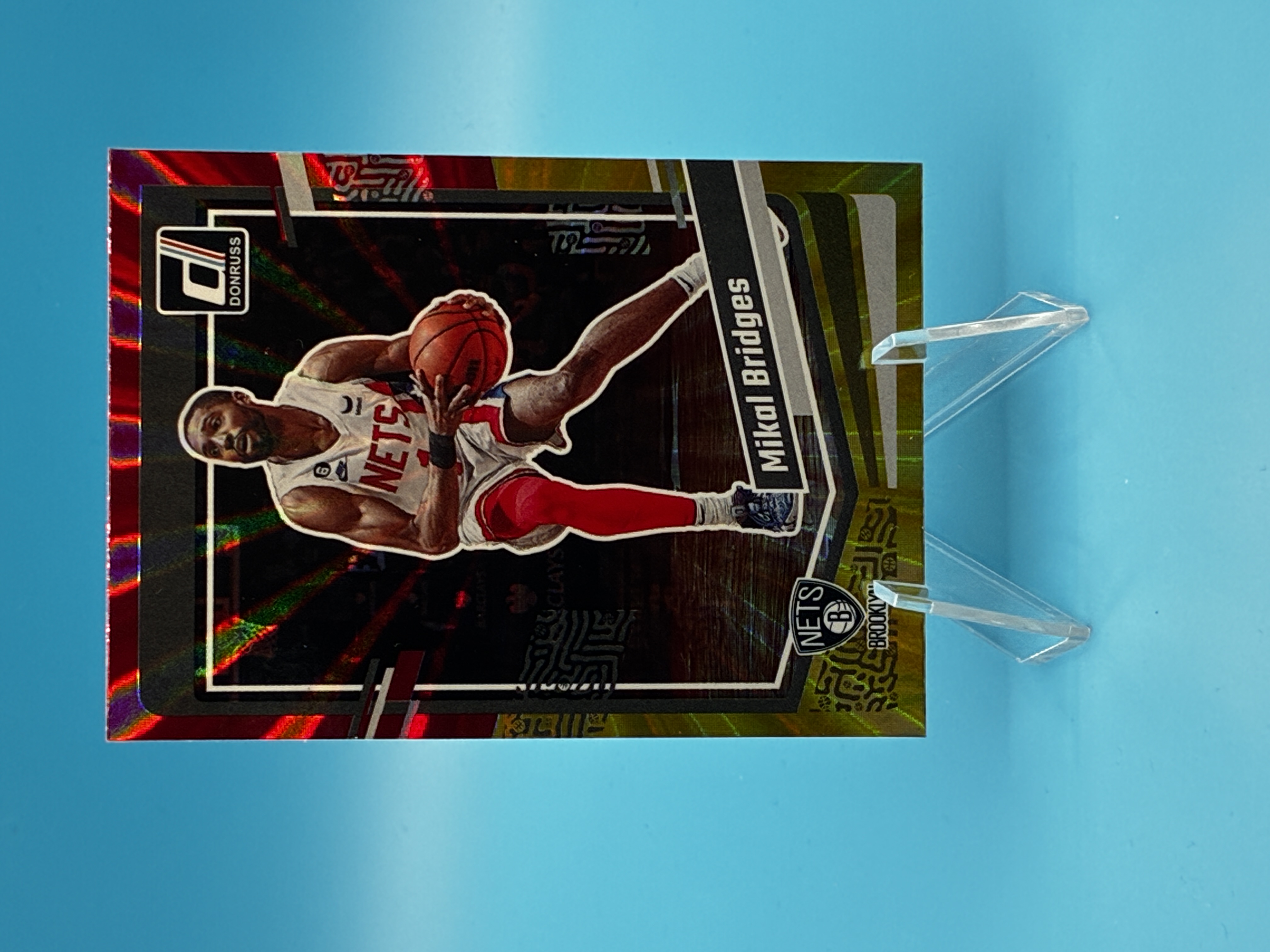 2023/2024 Panini Donruss Mikal Bridges Red Yellow Laser #70 Brooklyn Nets – Vorderseite