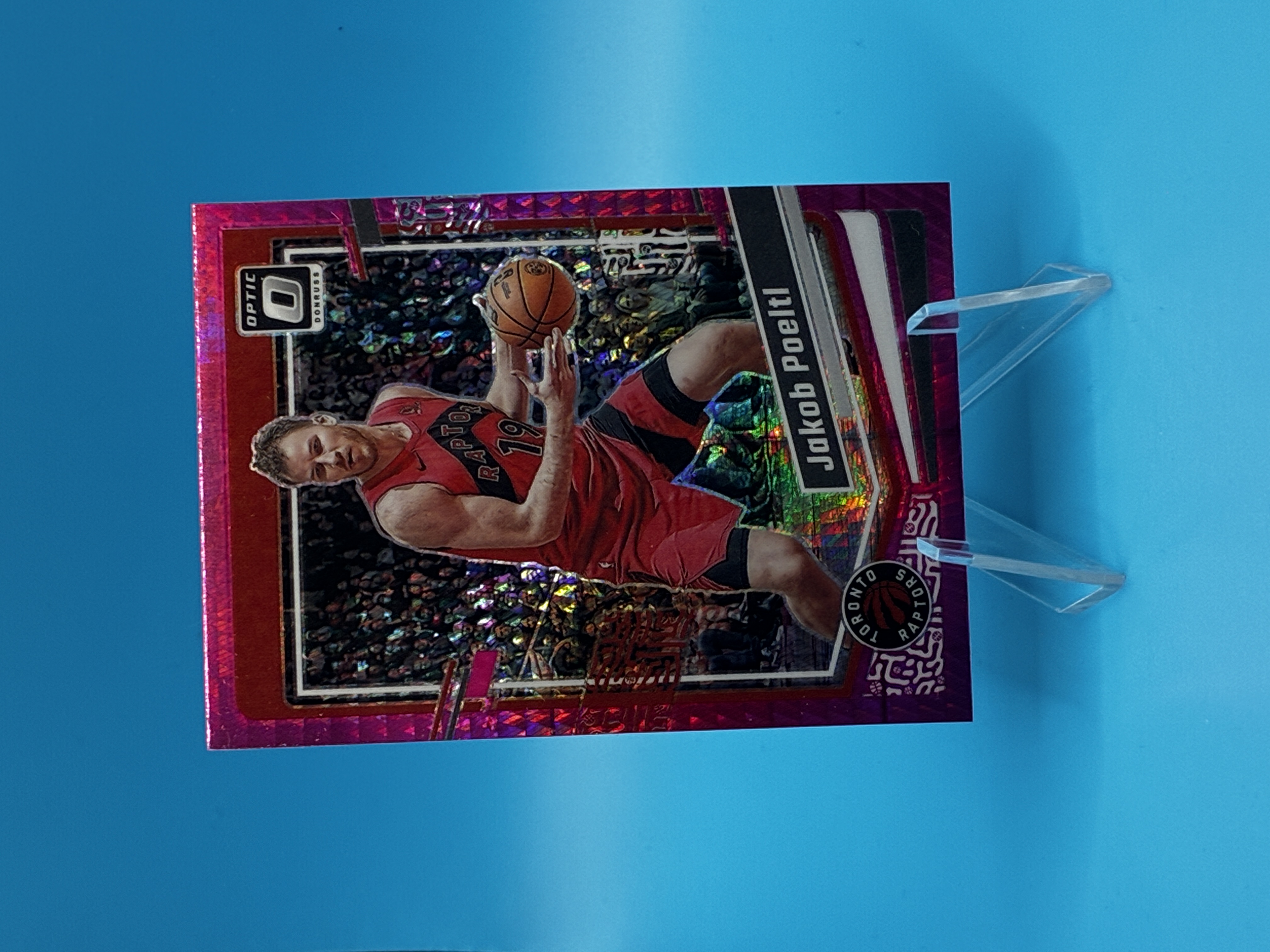 2023/2024 Panini Donruss Optic Jakob Poeltl Pink Velocity #94 Toronto Raptors – Vorderseite