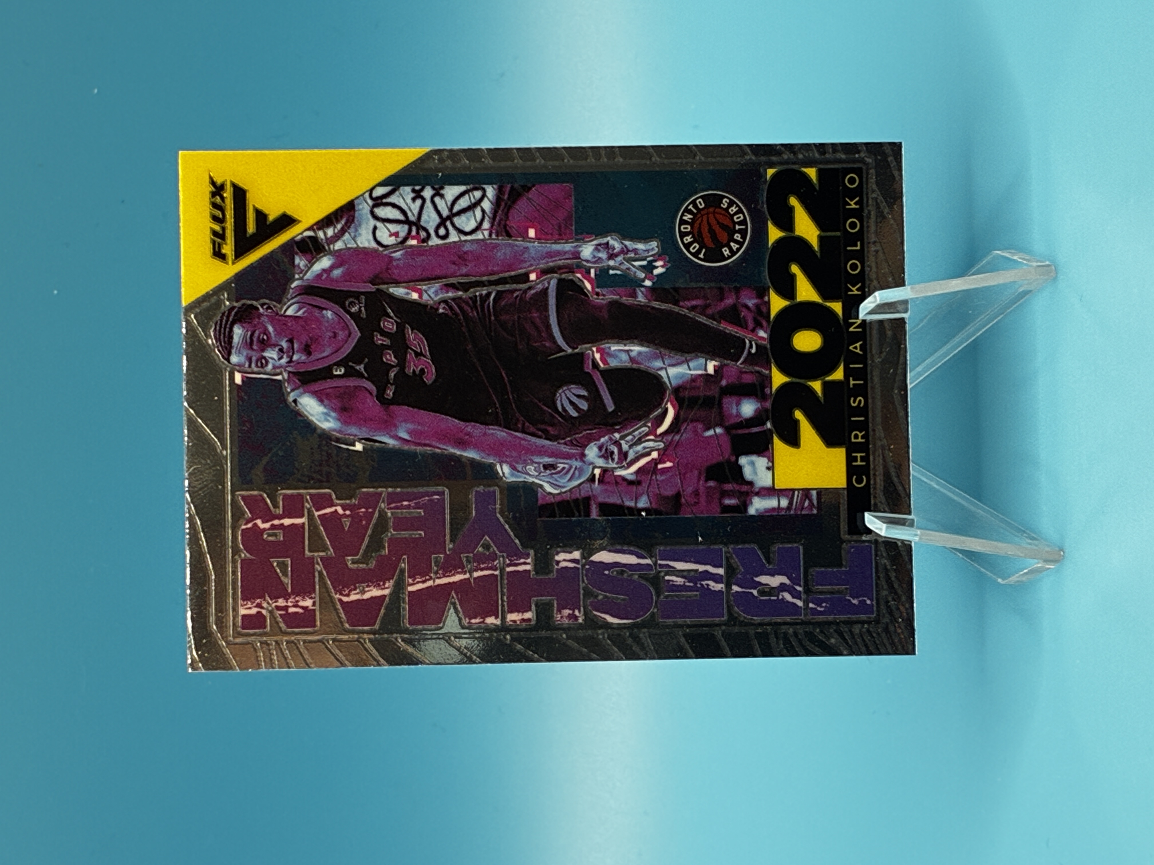 2022/2023 Panini Flux Christian Koloko Freshman Year #16 Toronto Raptors – Vorderseite